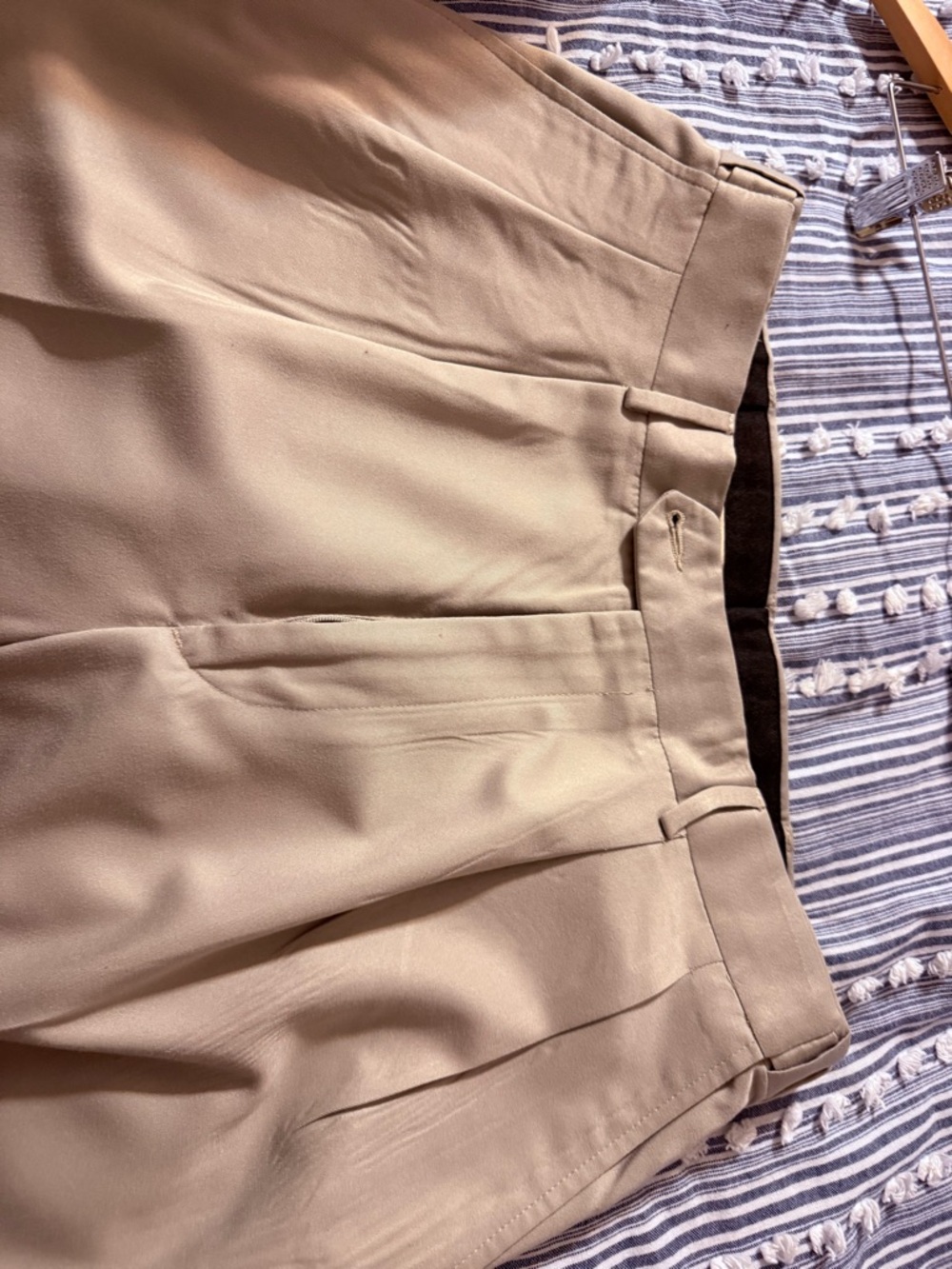 Tan men’s pleated khakis
